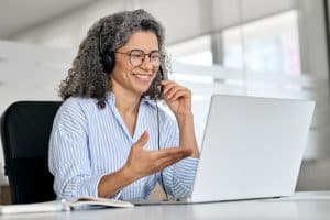 Business woman taking a phone call.