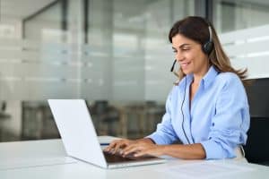 Business woman using VoIP