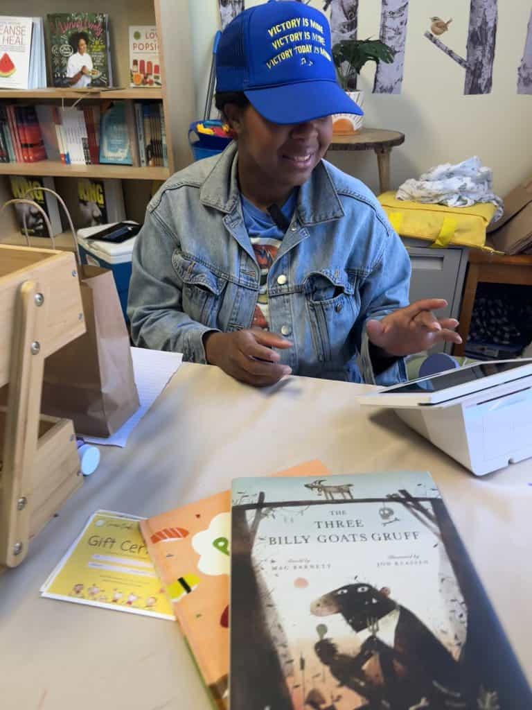 Edith Johnson checks out some books.